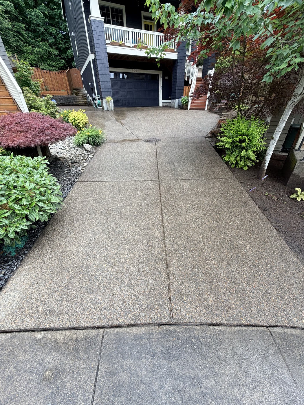 After professional pressure washing — clean Portland area driveway